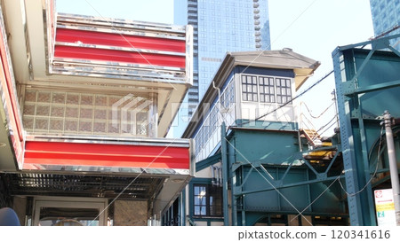 New York elevated subway, metropolitan bridge, metro track above street. Railway transport over road New York elevated subway, metropolitan bridge, metro track above street. Railway transport over road 120341616