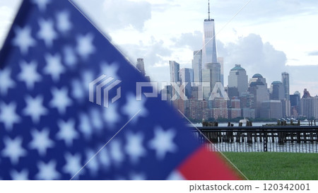 New York City waterfront skyline, Manhattan Downtown World Trade Center cityscape. American USA flag New York City waterfront skyline, Manhattan Downtown World Trade Center cityscape. American USA flag 120342001