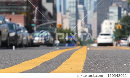 New York City skyline, Manhattan cityscape. Dividing line in Queens, Long Island street road, USA. 120342011