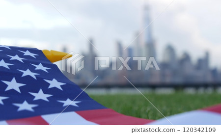 New York City waterfront skyline, Manhattan Downtown World Trade Center cityscape. American USA flag New York City waterfront skyline, Manhattan Downtown World Trade Center cityscape. American USA flag 120342109