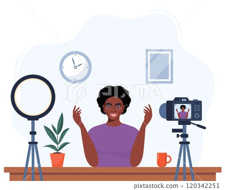 African American woman blogger records herself on video using a camera and a circle light lamp. Vector character influencer creating a video review for a blog. Flat illustration. 120342251