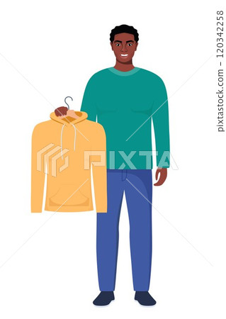 Smiling young black man holding hanger with yellow hoody. Choosing clothes concept. Vector illustration in flat style. Smiling young black man holding hanger with yellow hoody. Choosing clothes concept. Vector illustration in flat style. 120342258