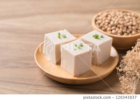 Fresh tofu with soy bean seeds, Vegan food ingredient in Asian cuisine, Plant based diet 120343837