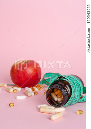 Weight Loss Pills and Measuring Tape, Diet Supplements Capsules, Obesity Lose Tablets, Color Drugs Pile Weight Loss Pills and Measuring Tape, Diet Supplements Capsules, Obesity Lose Tablets, Color Drugs Pile 120343963