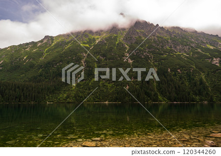 Alpine lake landscape, Morskie Oko or Sea Eye in high Tatras mountain of Tatra national park, Poland Alpine lake landscape, Morskie Oko or Sea Eye in high Tatras mountain of Tatra national park, Poland 120344260