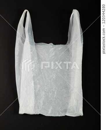 White Plastic Bags on Black Background, Crumpled Plastic Bag after Shopping, Cellophane Packaging Waste White Plastic Bags on Black Background, Crumpled Plastic Bag after Shopping, Cellophane Packaging Waste 120344280