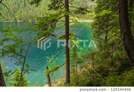 Alpine lake landscape, Morskie Oko or Sea Eye in high Tatras mountain of Tatra national park, Poland Alpine lake landscape, Morskie Oko or Sea Eye in high Tatras mountain of Tatra national park, Poland 120344408
