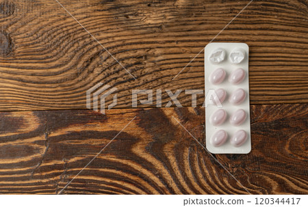 Pill Blister on Wooden Background, Silver Capsule Package Mockup, Drugs Packaging Banner, Pill Pack Pill Blister on Wooden Background, Silver Capsule Package Mockup, Drugs Packaging Banner, Pill Pack 120344417
