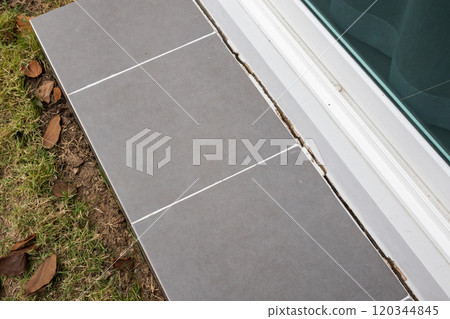 cracked concrete floor of the house 120344845