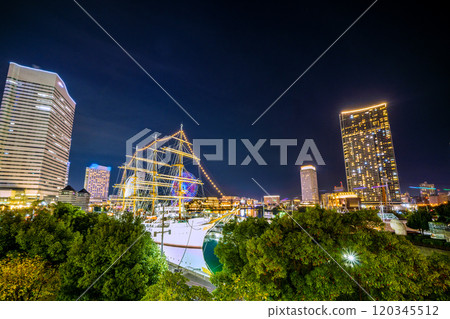 Yokohama cityscape in Japan, overlooking Sakuragicho Station, Nippon Maru, and the Minato Mirai area. A ray of hope for a new era = November 17th Yokohama cityscape in Japan, overlooking Sakuragicho Station, Nippon Maru, and the Minato Mirai area. A ray of hope for a new era = November 17th 120345512
