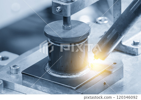 Close up scene of the robot welding machine operation with lighting effect. Close up scene of the robot welding machine operation with lighting effect. 120346092