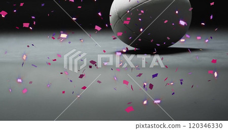 Image of confetti over white rugby ball on black background Image of confetti over white rugby ball on black background 120346330