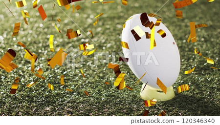 Image of confetti over white rugby ball on grass Image of confetti over white rugby ball on grass 120346340