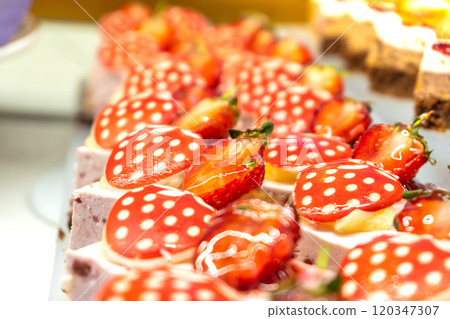 Fruit Mousse Pastries with Cream Cheese and Fresh Strawberries, Close-Up Fruit Mousse Pastries with Cream Cheese and Fresh Strawberries, Close-Up 120347307