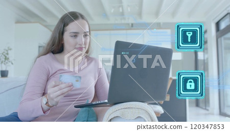 Image of padlock and key icons and data over caucasian woman paying online with card Image of padlock and key icons and data over caucasian woman paying online with card 120347853