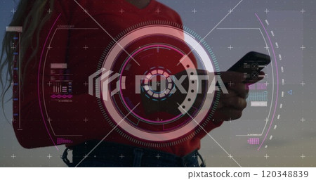 Image of data processing and scope scanning over biracial woman using smartphone 120348839