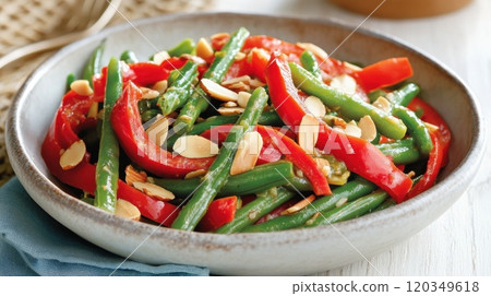 Fresh green bean and red pepper salad with toasted almonds in a rustic bowl Fresh green bean and red pepper salad with toasted almonds in a rustic bowl 120349618