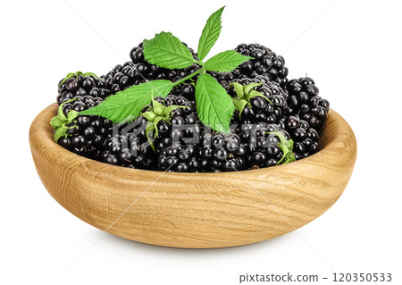 blackberry with leaf in wooden bowl isolated on a white background closeup. 120350533