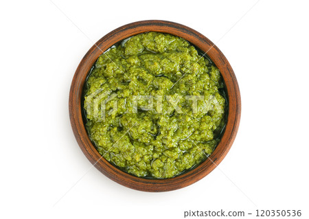 Pesto sauce in ceramic bowl isolated on white background. Top view. Flat lay 120350536