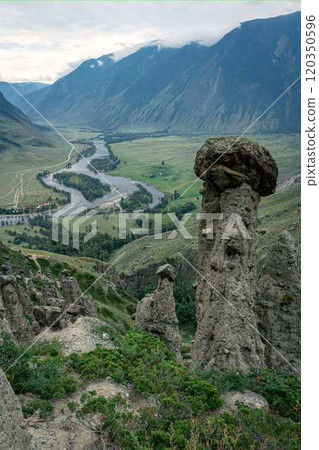 Picturesque green River Valley. Summertime natural landscape, mountains in the clouds, best recreation areas 120350596