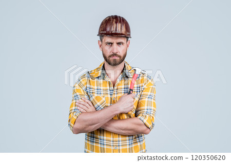 he is ready. man architect with hammer. guy wear worker uniform. handsome builder in helmet. mature man wear checkered shirt. professional constructor or mechanic. builder engineer he is ready. man architect with hammer. guy wear worker uniform. handsome builder in helmet. mature man wear checkered shirt. professional constructor or mechanic. builder engineer 120350620