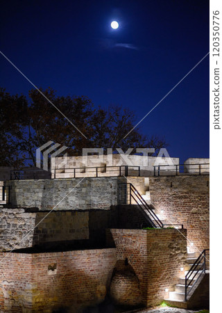 Remains of Historic Belgrade Fortress fortifications in Kalemegdan park at night in Belgrade, Serbia 120350776