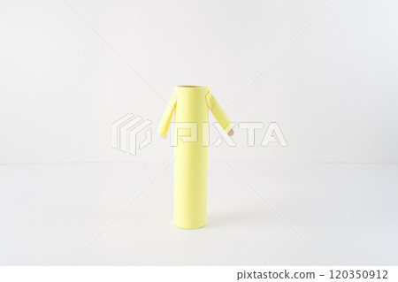 step by step instruction how to make bunny craft for egg holder for Easter holiday, table decoration. body wrapped in yellow paper, arms are made from paper as well. creative and fun craft project, 120350912