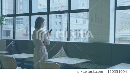 Image of financial data processing over asian businesswoman in office Image of financial data processing over asian businesswoman in office 120351094