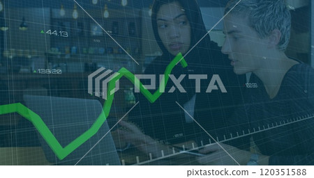 Analyzing financial data, women in office with stock market image over them 120351588