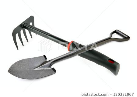 Rake and shovel isolated on white, top view. Gardening tool 120351967