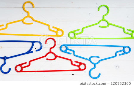 many different clothes hangers 120352360