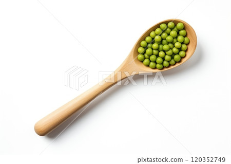 Top view of a wooden spoon with green peas on white background. Healthy vegetarian food, rich in protein and vitamins. Perfect for cooking, recipe or food related content 120352749