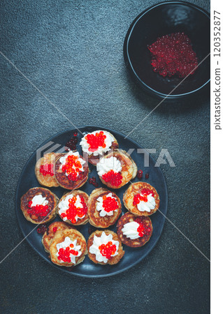 Demidoff pancakes, mini pancakes, with sour cream and red caviar, crepes. homemade, no people, Demidoff pancakes, mini pancakes, with sour cream and red caviar, crepes. homemade, no people, 120352877