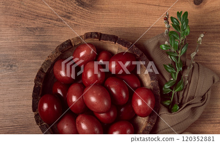 painted eggs in a wooden bowl, red, painted madder dye, powder from the roots of endro, with onion husks, top view, Easter, Georgia, painted eggs in a wooden bowl, red, painted madder dye, powder from the roots of endro, with onion husks, top view, Easter, Georgia, 120352881