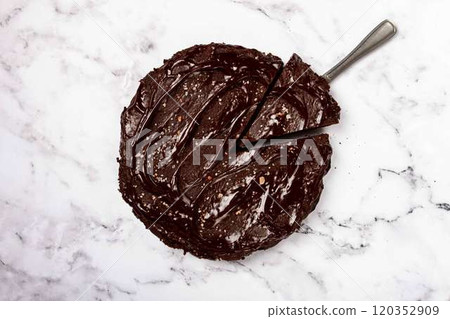 chocolate cake, round cake, on a marble light table, top view, homemade cakes, no people, chocolate cake, round cake, on a marble light table, top view, homemade cakes, no people, 120352909