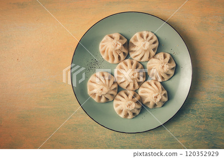 Traditional Georgian dish, Khinkali, Kalakuri, top view, rustic style, no people, Traditional Georgian dish, Khinkali, Kalakuri, top view, rustic style, no people, 120352929