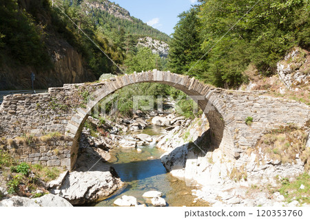 Ancient Roman bridge along the road to Anso, Spain. Ordesa valley 120353760