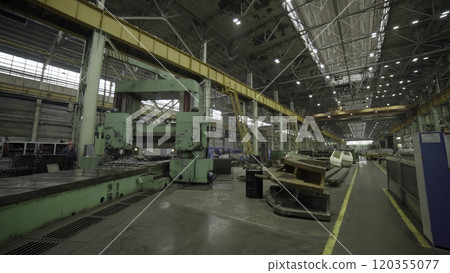 The interior of a modern manufacturing facility with advanced machinery for production. Stock Clip The interior of a modern manufacturing facility with advanced machinery for production. Stock Clip 120355077