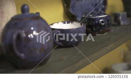 A Beautiful Artistic Display of Ceramic Pottery Featuring Vibrant and Colorful Designs. Stock Clip A Beautiful Artistic Display of Ceramic Pottery Featuring Vibrant and Colorful Designs. Stock Clip 120355138