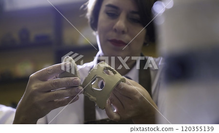 Artisan Crafting The Unique Process of Creating a Beautiful Ceramic Mug from Clay. Stock Clip 120355139