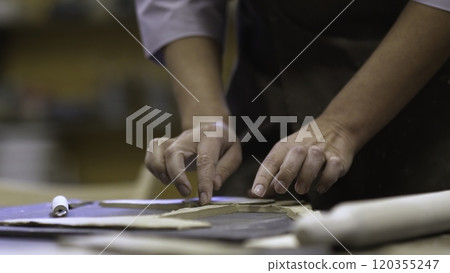 Engaging in Artisan Crafting with Dough A Detailed and Creative Culinary Process. Stock Clip Engaging in Artisan Crafting with Dough A Detailed and Creative Culinary Process. Stock Clip 120355247