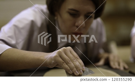 Craftsmanship in Action An Engaging Focus on Artisanal Detailing Techniques and Skills. Stock Clip 120355290