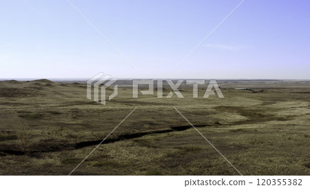 An Expansive Prairie Landscape Spread Out Beneath a Beautifully Clear Blue Sky Above. Stock Clip 120355382