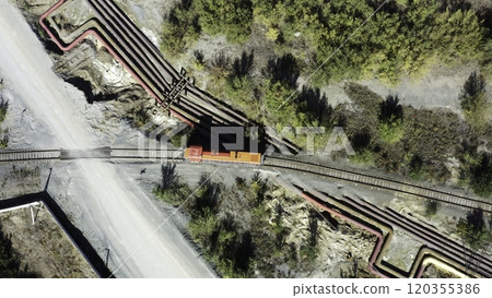 Aerial View of a Train on Tracks Amidst Beautiful Nature and Greenery, Showing Calmness. Stock Clip Aerial View of a Train on Tracks Amidst Beautiful Nature and Greenery, Showing Calmness. Stock Clip 120355386