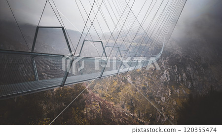 View of the Ponte 516 Arouca bridge in Portugal. The highest bridge in Europe - the bridge near Arouca in Portugal in cloudy weather 120355474