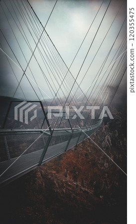 View of the Ponte 516 Arouca bridge in Portugal. The highest bridge in Europe - the bridge near Arouca in Portugal in cloudy weather View of the Ponte 516 Arouca bridge in Portugal. The highest bridge in Europe - the bridge near Arouca in Portugal in cloudy weather 120355475