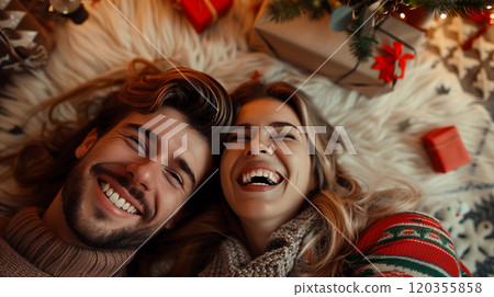 Young Couple Laying On Their Backs Surrounded By Christmas Gifts and Decorations Laughing. Generative AI. 120355858