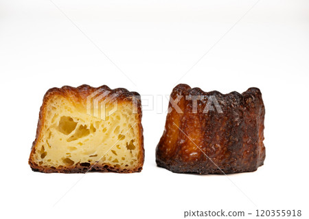 Canneles de bordeaux, traditional French sweet dessert with white table background 120355918