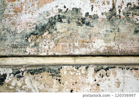Collapsed layers of peeling paint. Many spot colors - white, green, carmine, pale yellow Collapsed layers of peeling paint. Many spot colors - white, green, carmine, pale yellow 120356997