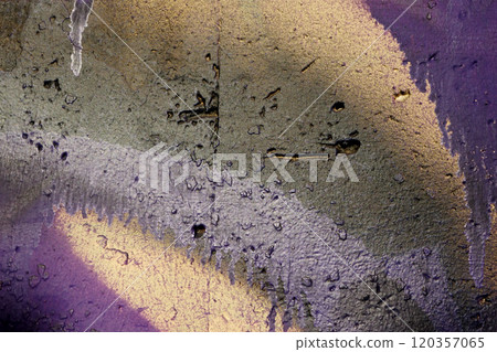 Stripes and splashes of purple paint with colored stains on the wall Stripes and splashes of purple paint with colored stains on the wall 120357065
